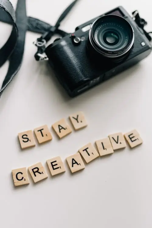 Gratis Cámara Negra Sobre Superficie Blanca Foto de stock